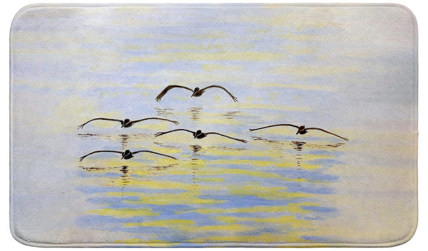 Cruising Pelicans Bath Mat